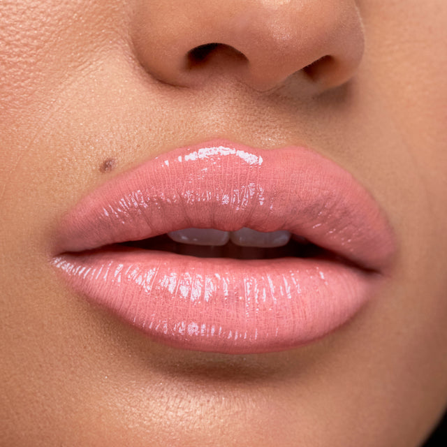 Medium skin tone model wearing Wet Stick in Skinny Dip