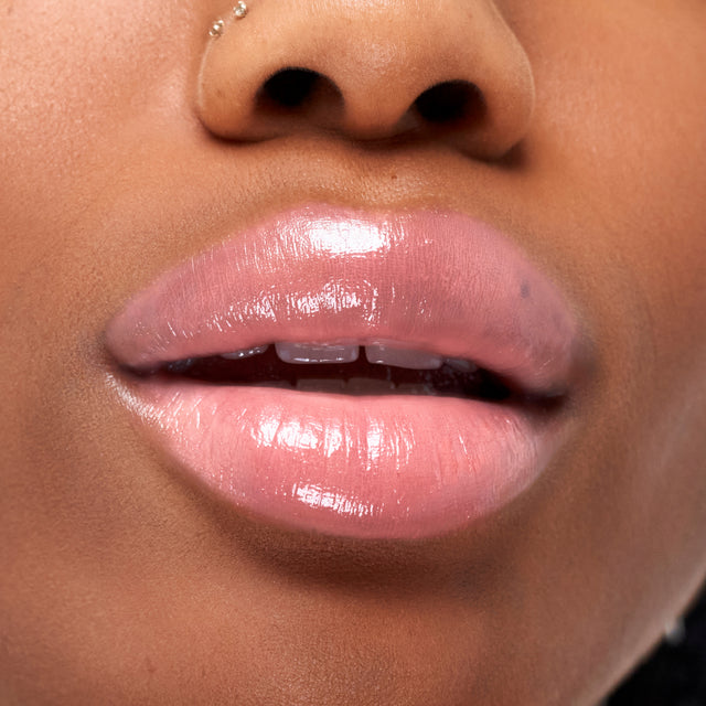 Deep skin tone model wearing Wet Stick in Skinny Dip