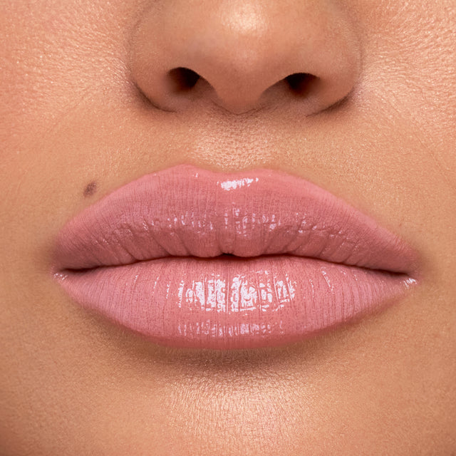 Medium skin tone model wearing Wet Stick in Baby Rose