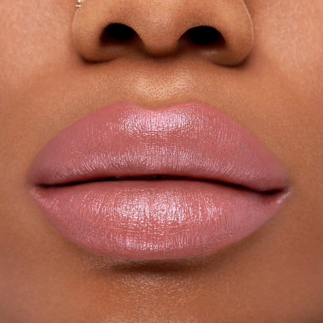 Deep skin tone model wearing Weightless Lip Color in Fantasy Life