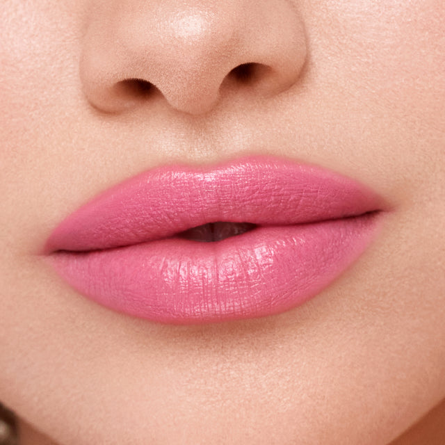 Light skin tone model wearing Weightless Lip Color in Beach House