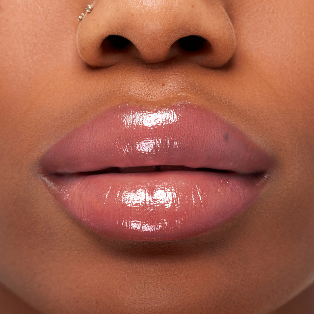 Deep skin tone model wearing Wet Stick in Hot Beach