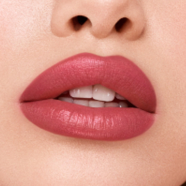 Light skin tone model wearing Weightless Lip Color in Daydream