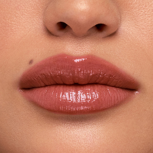 Medium skin tone model wearing Wet Stick in Island High