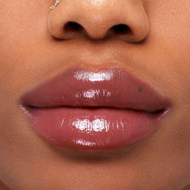 Deep skin tone model wearing Wet Stick in Island High