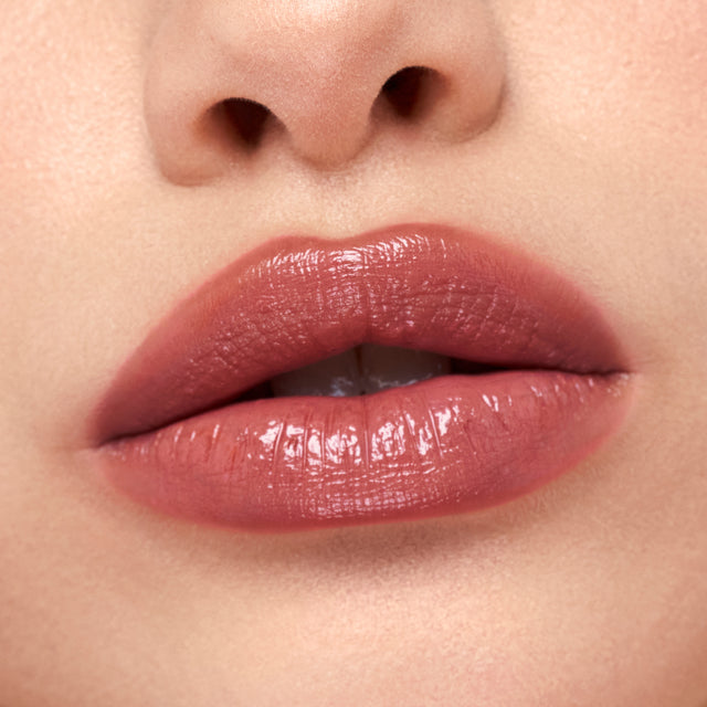 Light skin tone model wearing Wet Stick in Tropic Bliss