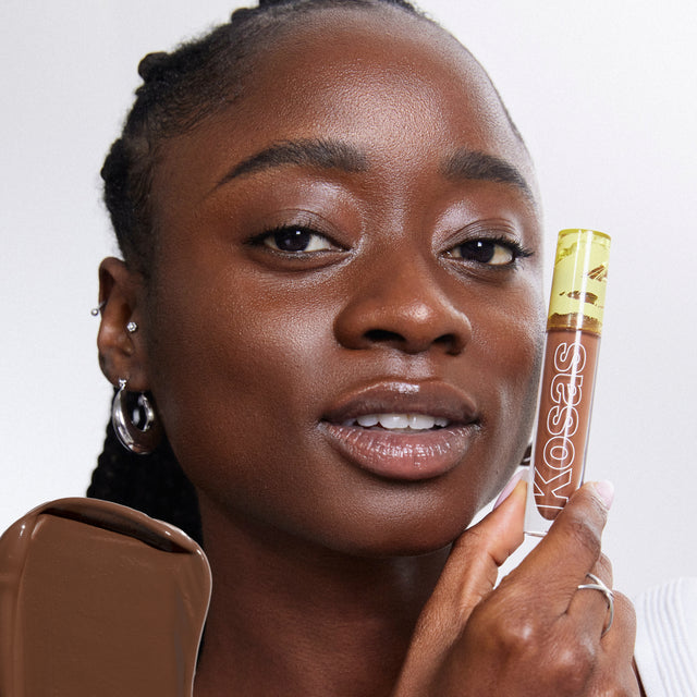 Model wearing Revealer Concealer in Tone 10 W