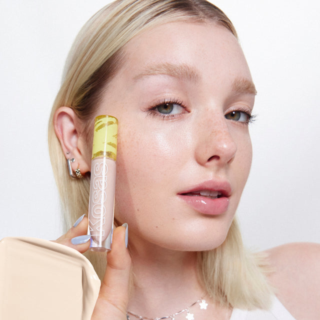 Model wearing Revealer Concealer in Tone 2.3 N