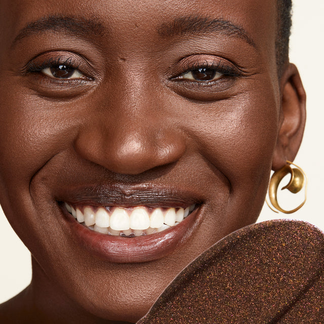 Model wearing Glow I.V. in Reflect