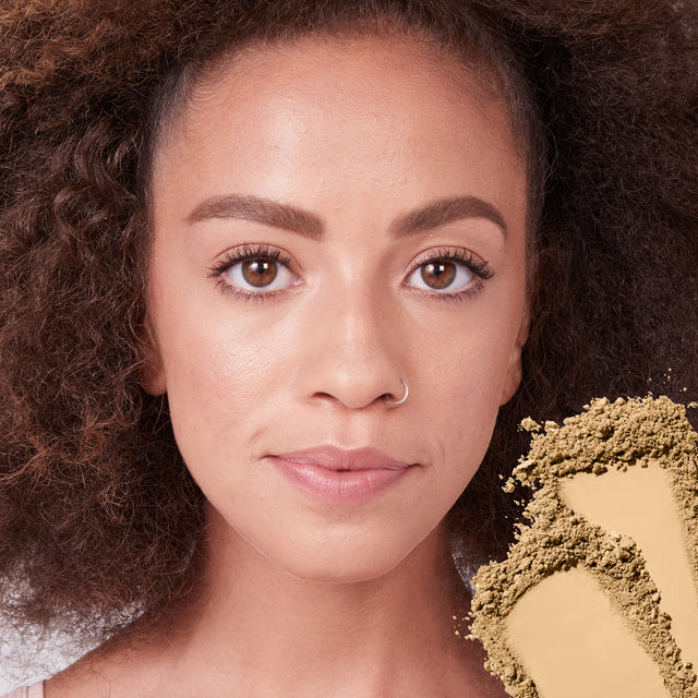 Model wearing Cloud Set Setting Powder in Cushiony