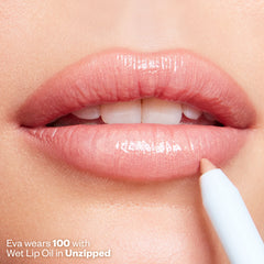 Eva wears 100 with Wet Lip Oil in Unzipped
