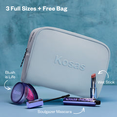Kosas holiday set with a blue makeup bag