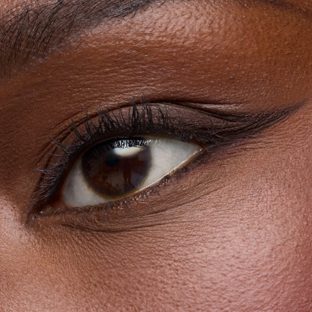 Deep skin tone model wearing Soulgazer in Allure