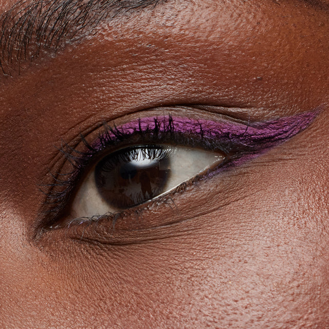 Deep skin tone model wearing Soulgazer in Bewitch