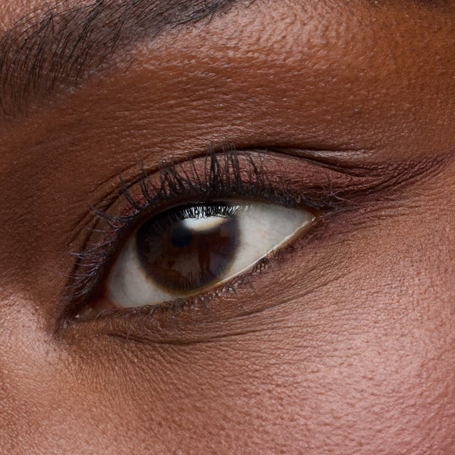 Deep skin tone model wearing Soulgazer in Depth