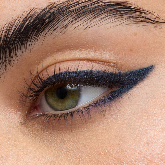 Green eye model wearing Soulgazer in Enigma