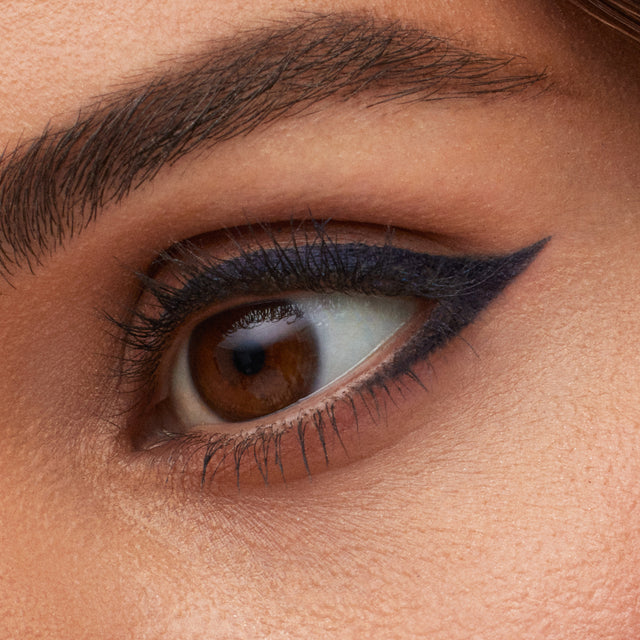 Light brown eye model wearing Soulgazer in Enigma