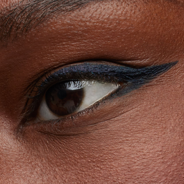 Deep skin tone model wearing Soulgazer in Enigma