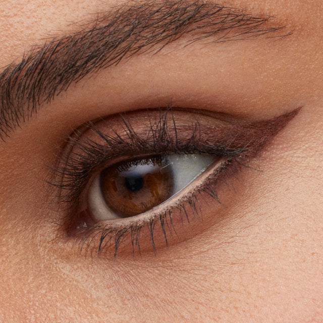 Light brown eye model wearing Soulgazer in Gravitate