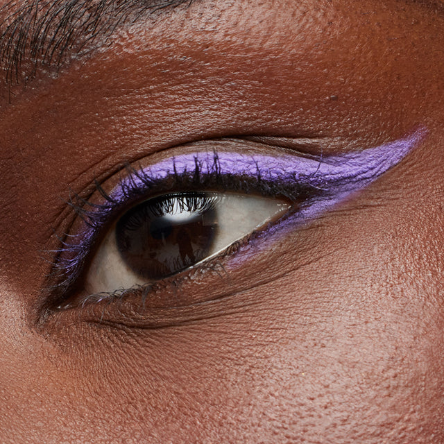 Deep skin tone model wearing Soulgazer in Mesmerize