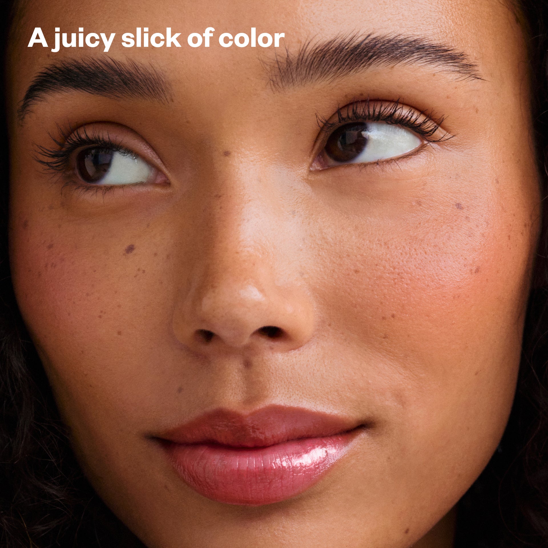 A juicy slick of color - Wet Lip Oil in Grapesicle on Model's Lips